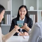 An investment property owner analyzes cash flow and rental revenue to qualify for rental property financing.