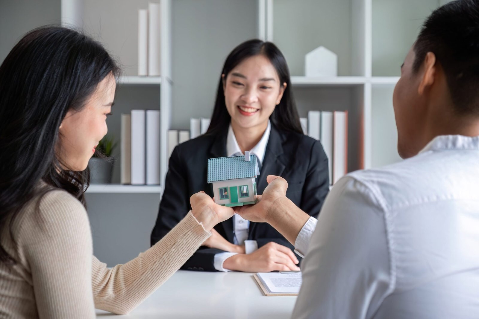 An investment property owner analyzes cash flow and rental revenue to qualify for rental property financing.