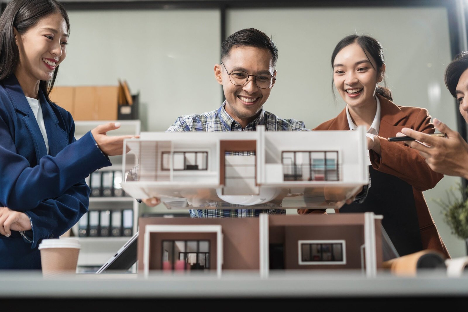 A first-time homebuyer meets with a mortgage advisor to discuss pre-approval and financing options.